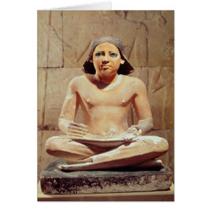 Scribe seated cross-legged