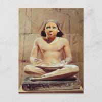 Scribe seated cross-legged