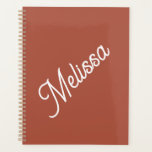Script monogram, modern terracotta colour planner<br><div class="desc">Large script typography makes a bold statement against the terracotta coloured background. Simple yet elegant, it's a personal gift they'll love for birthday, Christmas, back to school and more.</div>