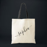 Script Name Personalised Modern Simple Tote Bag<br><div class="desc">Chic personalised labelled reusable canvas tote bag with custom name text for bridesmaid gifts, bachelorette parties, birthday favours, and girls trip keepsakes, and graduation gift for cute college and dorm room storage. Perfect for sports and hobby gear storage and transport. Colours and fonts are editable, just click “customise further” to...</div>