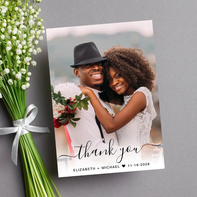 Script Photo Overlay Cream Wedding Thank You Card (Celebrate your love story with a thank you card showcasing your favorite wedding day photo)