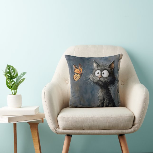 Scruffy Cat Staring at a Butterfly Cushion (Chair)