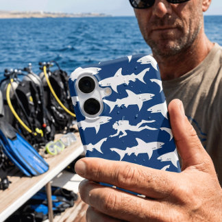 Scuba Diver Swimming with a School of Sharks