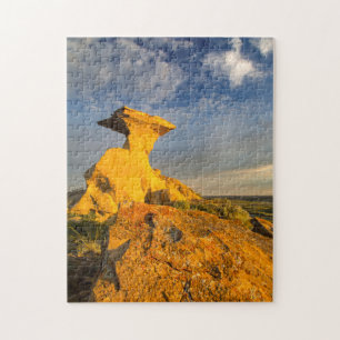 Sculpted Badlands Formation In Short Grass Jigsaw Puzzle