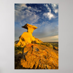 Sculpted Badlands Formation In Short Grass Poster