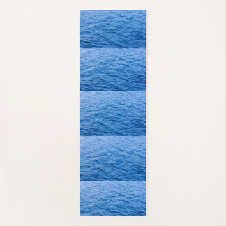 sea and mountains on yoga mat
