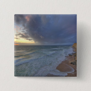 Sea cliffs catch days last light at Pomponi 15 Cm Square Badge