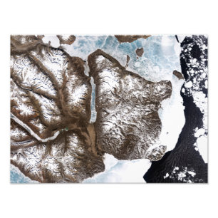 Sea ice lines the shoreline in eastern Greenlan Photo Print
