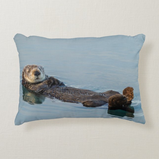 Sea otter floating on back in ocean decorative cushion (Front)