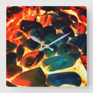 Sea oyster shell on red-hot volcanic lava or ember square wall clock
