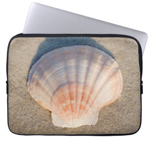 Sea Shell Laying On Sandy Beach Laptop Sleeve