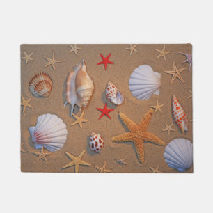 Sea Shells And Starfish Arranged On Sand Doormat