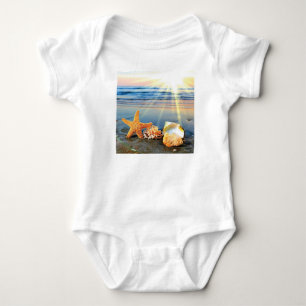 Sea shells and starfish on beach baby bodysuit