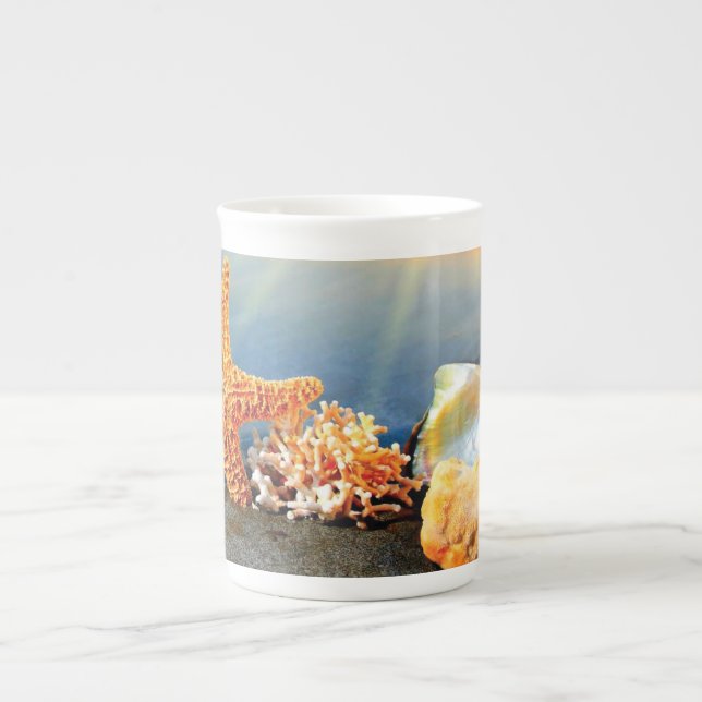 Sea shells and starfish on beach bone china mug (Front)