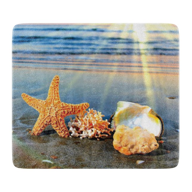 Sea shells and starfish on beach cutting board (Front)