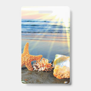 Sea shells and starfish on beach ID badge