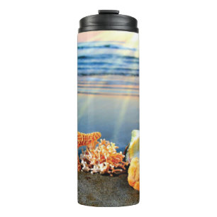 Sea shells and starfish on beach thermal tumbler
