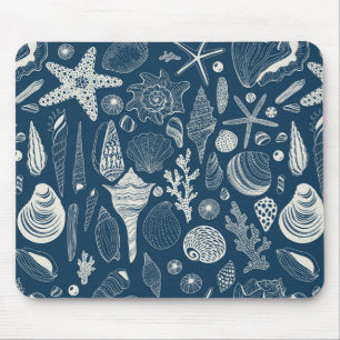 Sea shells on dark blue mouse mat
