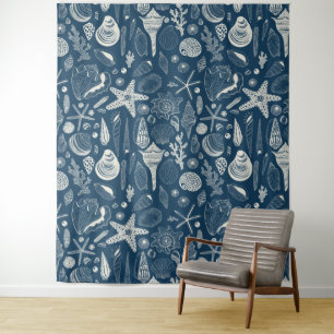 Sea shells on  dark blue tapestry