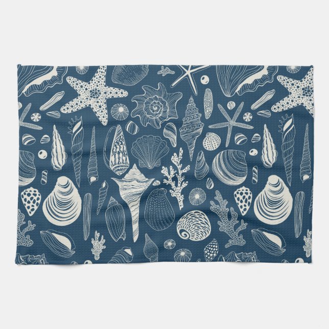 Sea shells on  dark blue tea towel (Horizontal)