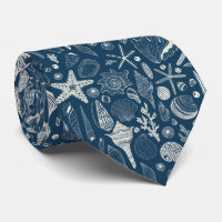 Sea shells on dark blue