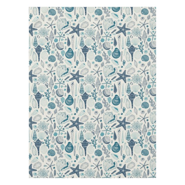 Sea shells on  off white tablecloth (Front)