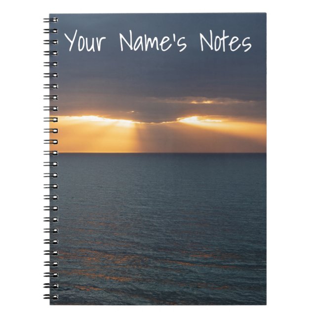 Sea sunset rays breaking through the clouds notebook (Front)