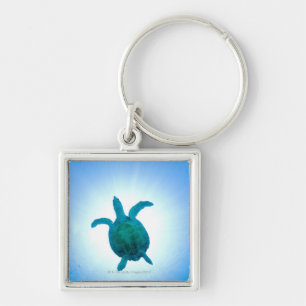 Sea turtle swimming underwater key ring