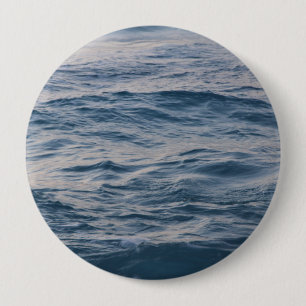 Sea water closeup 10 cm round badge