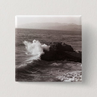 Sea waves crashing against rock 15 cm square badge