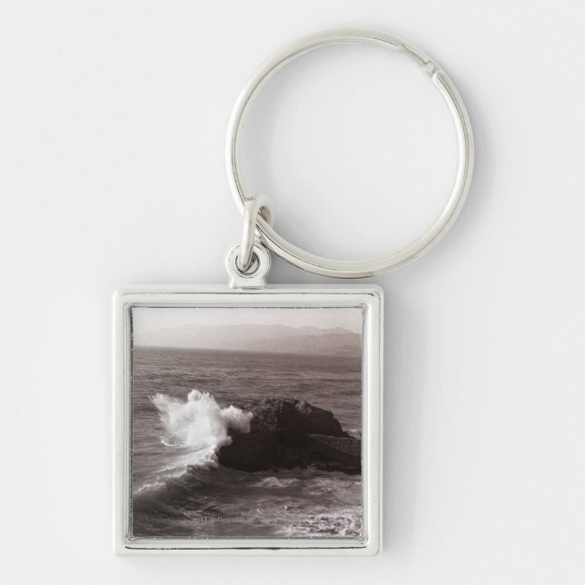 Sea waves crashing against rock key ring (Front)
