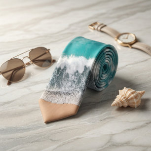 Sea waves wash over the sandy beach tie