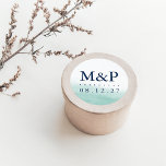 Seaglass Tides Wedding Monogram Classic Round Sticker<br><div class="desc">Seal your invitation envelopes, favours and more with our coastal chic monogrammed stickers. Round design features your initials and wedding date in deep marine navy blue lettering with a seaglass green watercolor wash background that evokes the ebb and flow of the sea. Coordinates with our Seaglass Tides wedding invitation collection....</div>