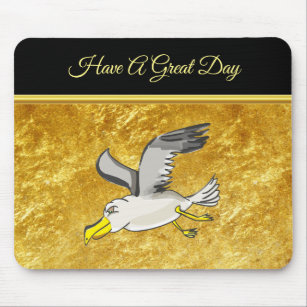 Seagull flying over head with a gold foil design mouse mat