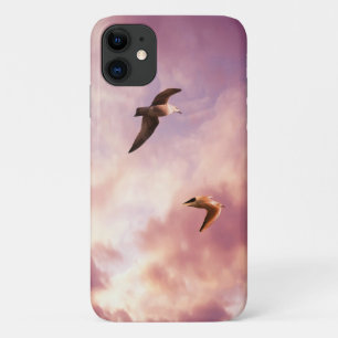 Seagulls flying in a sunset sky iPhone 11 case