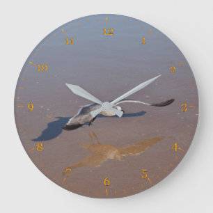 Seagulls reflection and shadow on the beach sand large clock