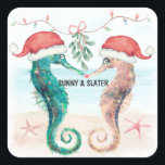 Seahorse Kiss Beach Christmas Couples Shower Square Sticker<br><div class="desc">Add a cute coastal touch when you send out your invitations with these beach theme Christmas couples shower stickers! Featuring a watercolor seahorse couple on a tropical beach wearing Santa hats and kissing under mistletoe. Perfect for winter and Christmas time shower celebrations. Art by KL Stock.</div>