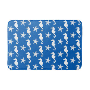 Seahorse & starfish - white on cobalt blue bath mat