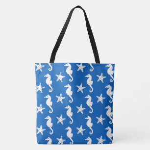 Seahorse & starfish - white on cobalt blue tote bag
