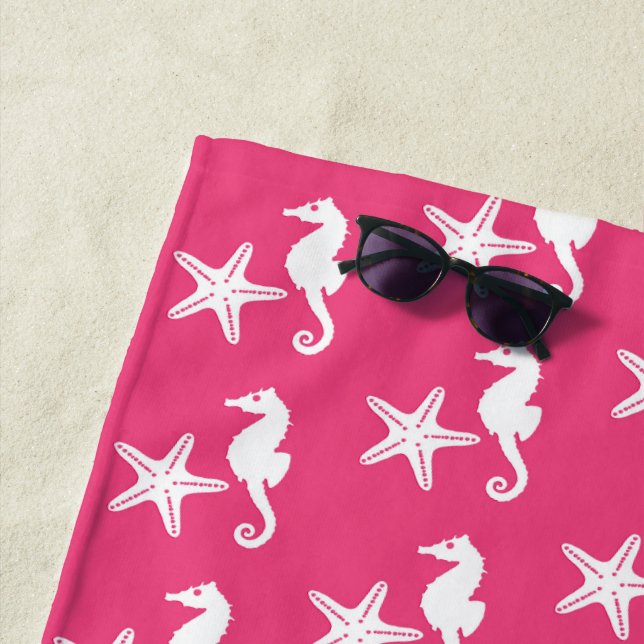 Seahorse & starfish, white on fuchsia pink beach towel (In Situ)