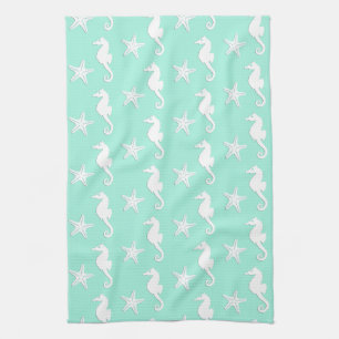 Seahorse & starfish - white on pale aqua tea towel