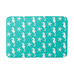 Seahorse & starfish - white on turquoise bath mat