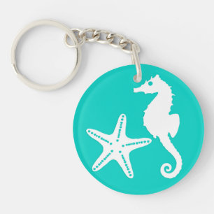 Seahorse & starfish - white on turquoise key ring