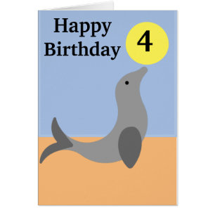 Seal balancing a yellow ball age