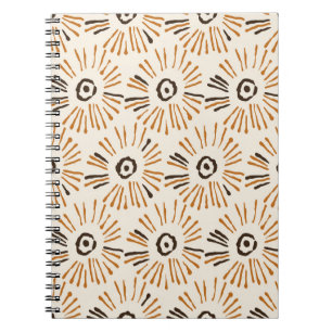 Seamless geometric batik floral pattern on autumn notebook