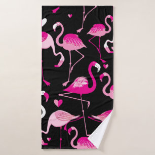 Seamless pattern from pink flamingos on a dark bac bath towel