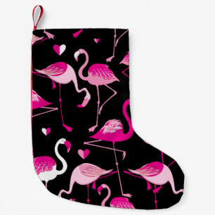 Seamless pattern from pink flamingos on a dark bac small christmas stocking