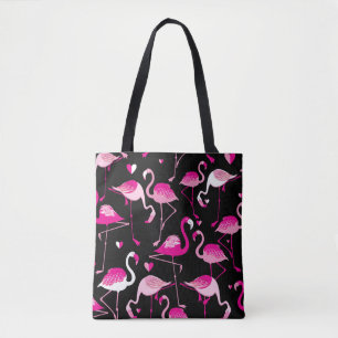 Seamless pattern from pink flamingos on a dark bac tote bag