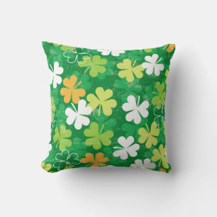 Seamless pattern of scattered clovers and shamrock cushion