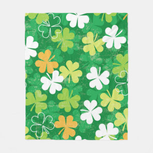 Seamless pattern of scattered clovers and shamrock fleece blanket